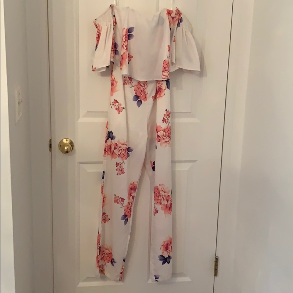Off the shoulder ruffled jumpsuit.